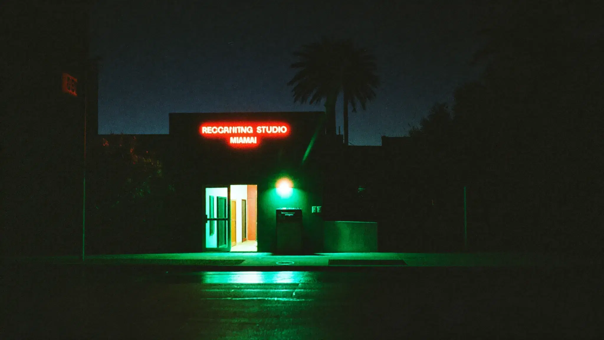 Miami skyline at night washed in green